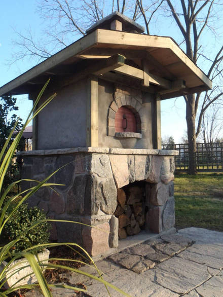 Traditional stone bake oven. A hand-hewn stone masonry project.