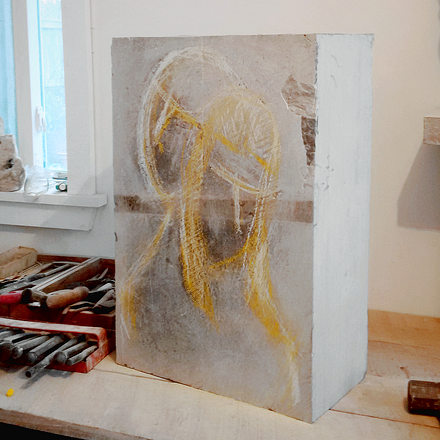 Daphne and Apollo in the studio. Initial sketch on a stone block.