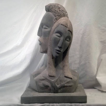 Daphne and Apollo. Limestone sculpture. 22in x 14in x 71/2in.