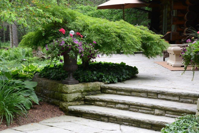 Hand-hewn stone garden pathway, stairs / steps, retaining wall and deck.