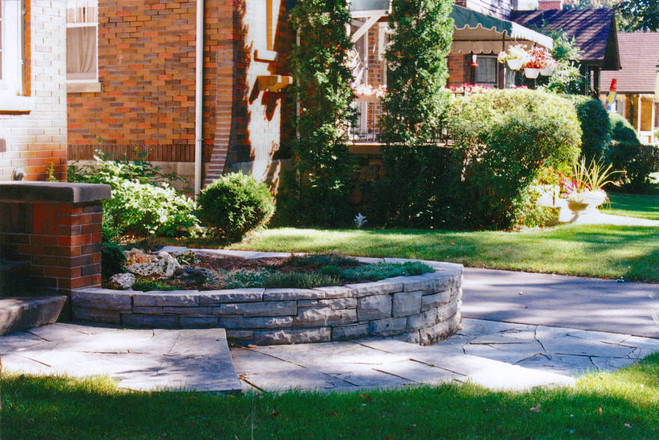 Limestone walkway steps and garden wall. A hard landscaping project.