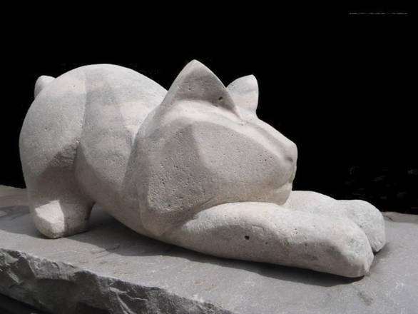 Young Lynx. Limestone sculpture. 2 x lifesize.