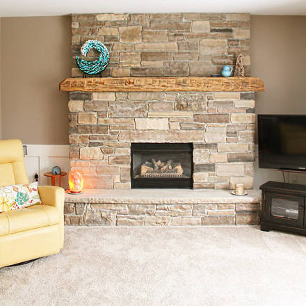 Hand-hewn stone fireplace.