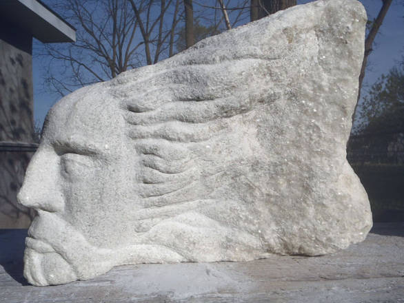 North Wind. White Calcite garden stone. Lifesize.
