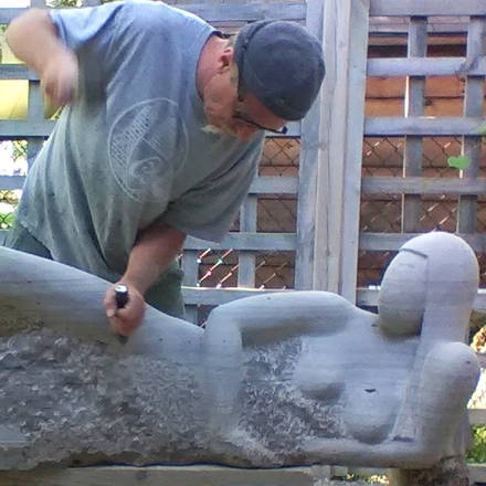 Carving stone.